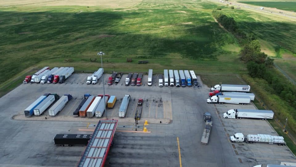Aerial view of trailers parked at a truck yard